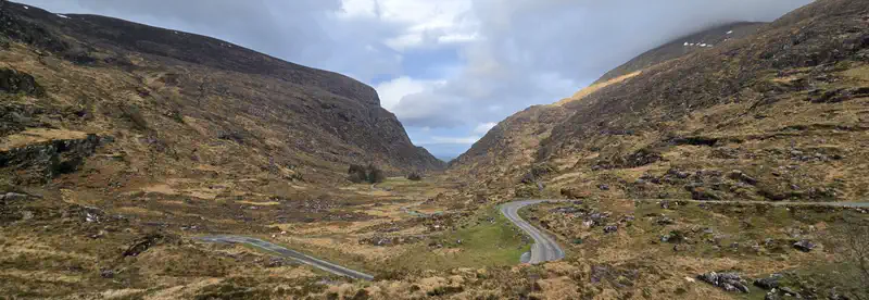 Cinematic view of a mountain road for Go Move Shift